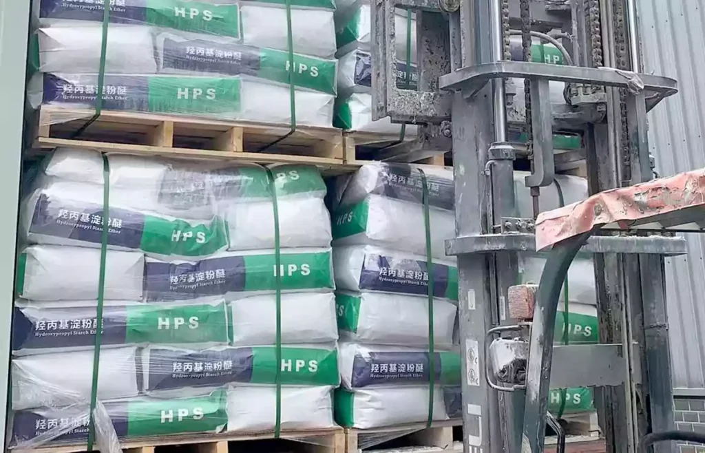 A forklift is inserting a pallet of HPS products into the cargo hold.